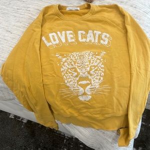 Daydreamer “Love Cats” sweatshirt in size Small.